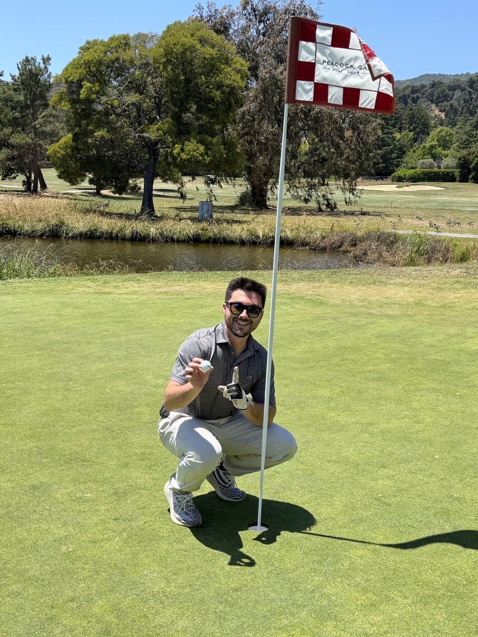 Matthew celebrating a hole-in-one at Peacock Gap Golf Club